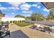 Backyard with putting green, patio, and grill at 3406 E Libby St, Phoenix, AZ 85032