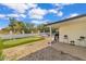 Covered patio, putting green and grill in backyard at 3406 E Libby St, Phoenix, AZ 85032
