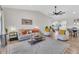 Bright and airy living room featuring hardwood floors, comfortable seating, and stylish decor at 3406 E Libby St, Phoenix, AZ 85032