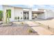 Modern home exterior with landscaped front yard and driveway at 8634 E Monterosa Ave, Scottsdale, AZ 85251