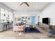 Open concept living room and kitchen with hardwood floors at 8634 E Monterosa Ave, Scottsdale, AZ 85251