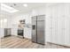 Modern kitchen with stainless steel appliances and white cabinetry at 8634 E Monterosa Ave, Scottsdale, AZ 85251