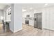 Updated kitchen boasts stainless steel appliances and white shaker cabinets at 8634 E Monterosa Ave, Scottsdale, AZ 85251