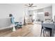Home office with wood floors, a desk and patio access at 8634 E Monterosa Ave, Scottsdale, AZ 85251