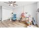 Relaxing bedroom with an artist's easel and comfy chair at 8634 E Monterosa Ave, Scottsdale, AZ 85251