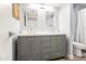 Double vanity bathroom with gray cabinets and a white countertop at 8634 E Monterosa Ave, Scottsdale, AZ 85251