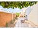 Landscaped side yard with a path and desert plants at 8634 E Monterosa Ave, Scottsdale, AZ 85251