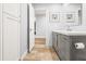 Gray vanity with white countertop and marble backsplash in this bathroom at 8634 E Monterosa Ave, Scottsdale, AZ 85251