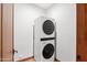 Convenient laundry room with stacked washer and dryer at 13118 N Founders Park Blvd, Surprise, AZ 85379