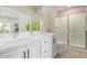 Modern bathroom with double vanity and glass shower at 2030 E Michigan Ave # 24, Phoenix, AZ 85022