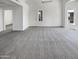 Bright living room featuring carpet flooring and access to other rooms at 17017 N 12Th St # 2124, Phoenix, AZ 85022