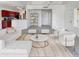 Living room with staged furniture, a kitchen, and entryway at 17017 N 12Th St # 2124, Phoenix, AZ 85022