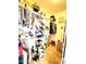 Large walk-in closet with ample shelving and hanging space at 17473 W Elizabeth Ave, Goodyear, AZ 85338