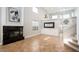 Bright living room featuring a fireplace and high ceilings at 17473 W Elizabeth Ave, Goodyear, AZ 85338