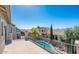 Backyard oasis with private pool and deck; neighborhood view at 17473 W Elizabeth Ave, Goodyear, AZ 85338