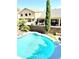 Inviting swimming pool with surrounding patio at 17473 W Elizabeth Ave, Goodyear, AZ 85338