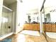 Spacious Primary bathroom with double vanity and large shower at 17473 W Elizabeth Ave, Goodyear, AZ 85338