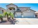Beautiful two-story home with a three-car garage and inviting curb appeal at 17473 W Elizabeth Ave, Goodyear, AZ 85338