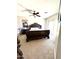 Large main bedroom with a comfortable bed and plenty of natural light at 17473 W Elizabeth Ave, Goodyear, AZ 85338