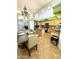 Large kitchen with an island, dining area, and ample cabinet space at 17473 W Elizabeth Ave, Goodyear, AZ 85338