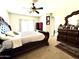 Elegant main bedroom with a luxurious bed and en-suite bathroom at 17473 W Elizabeth Ave, Goodyear, AZ 85338