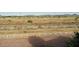 Large lot with desert landscape and white fence at 2300 E Magma Rd # 126, San Tan Valley, AZ 85143