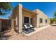 Front view of the home with patio seating at 2300 E Magma Rd # 126, San Tan Valley, AZ 85143