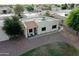 Tan stucco home with tile roof and patio at 2300 E Magma Rd # 126, San Tan Valley, AZ 85143