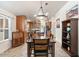 Kitchen with wood cabinets and an island at 8865 E Baseline Rd # 128, Mesa, AZ 85209