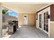 Covered patio with built-in grill and exterior access at 8865 E Baseline Rd # 128, Mesa, AZ 85209