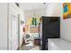 Bright laundry room, featuring washer, dryer, and storage at 8865 E Baseline Rd # 128, Mesa, AZ 85209