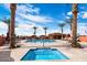 Community pool and spa with surrounding seating at 8865 E Baseline Rd # 128, Mesa, AZ 85209