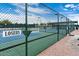Two tennis courts with chain link fence at 8865 E Baseline Rd # 128, Mesa, AZ 85209