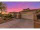 One-story home with a two-car garage and desert landscaping at 13820 W Cheery Lynn Rd, Avondale, AZ 85392