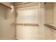 Walk-in closet with double hanging rods at 13820 W Cheery Lynn Rd, Avondale, AZ 85392
