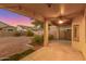 Covered patio with ceiling fan overlooking backyard at 13820 W Cheery Lynn Rd, Avondale, AZ 85392