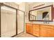 Bathroom with double vanity and large shower at 13820 W Cheery Lynn Rd, Avondale, AZ 85392