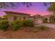 One-story home with a two-car garage and desert landscaping at 13820 W Cheery Lynn Rd, Avondale, AZ 85392