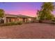 Spacious backyard with gravel and desert landscaping at 13820 W Cheery Lynn Rd, Avondale, AZ 85392