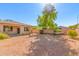 Large backyard with gravel and a hammock at 13820 W Cheery Lynn Rd, Avondale, AZ 85392