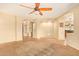 Open living room with neutral colors and tile flooring at 13820 W Cheery Lynn Rd, Avondale, AZ 85392