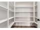 Walk-in pantry with ample shelving for storage at 40467 W Michaels Dr, Maricopa, AZ 85138