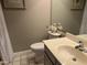 Clean bathroom with a single sink vanity, toilet, and shower at 10015 E Mountain View Rd # 2011, Scottsdale, AZ 85258