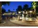 Beautiful fountain at night in community courtyard at 10015 E Mountain View Rd # 2011, Scottsdale, AZ 85258
