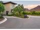 Modern gated community entrance with landscaping and signage at 18720 N 101St St # 2006, Scottsdale, AZ 85255