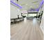 Open concept dining room with modern light fixture at 27222 N 64Th Dr, Phoenix, AZ 85083