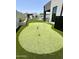 Private putting green in backyard next to the pool at 27222 N 64Th Dr, Phoenix, AZ 85083