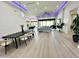 Modern dining room with chandelier and hardwood floors at 27222 N 64Th Dr, Phoenix, AZ 85083