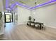 Elegant dining room with modern chandelier and hardwood floors at 27222 N 64Th Dr, Phoenix, AZ 85083