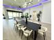 Open concept dining room with pool view at 27222 N 64Th Dr, Phoenix, AZ 85083